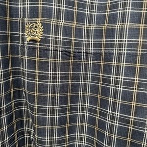 Cinch button down. Always sent to cleaners. Like New condition
